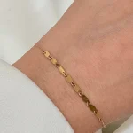 دستبند با پلاک های ریز بیضی