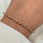 دستبند فول گوی دو رنگ زرد و سفید