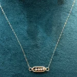 گردنبند با توپ طلا