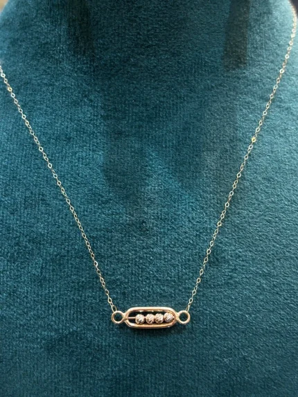 گردنبند با توپ طلا