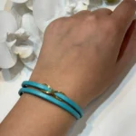 دستبند بی نهایت طلا با چرم آبی