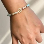 دستبند مهره دار با آویز خانه